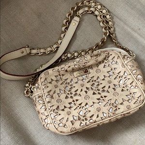 Laser cut leather crossbody camera style bag